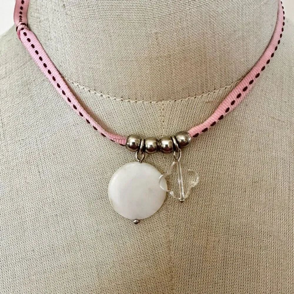 Marc Labat abalone pendant necklace on pink ribbon